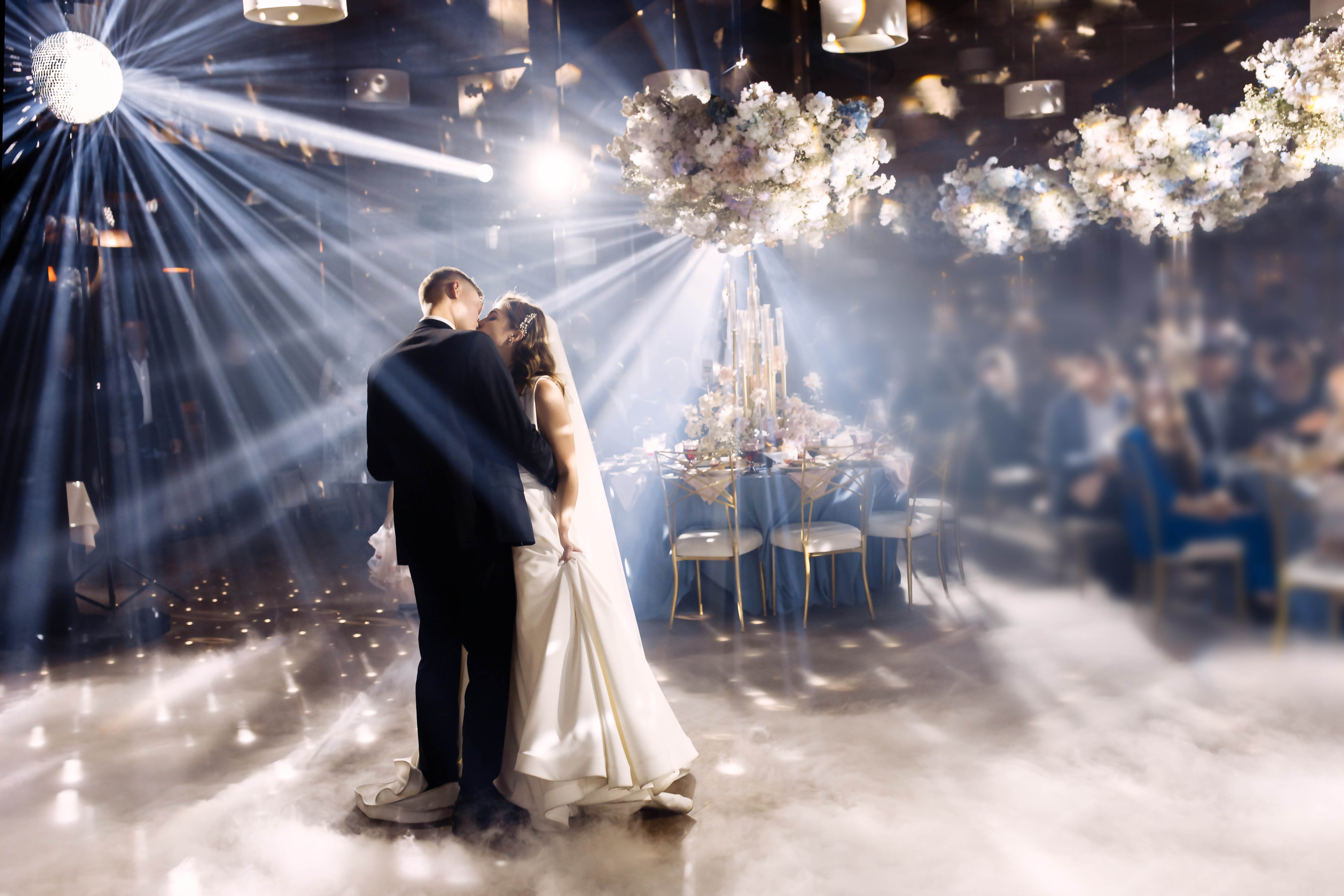 Photo of a bride and groom having their first dance